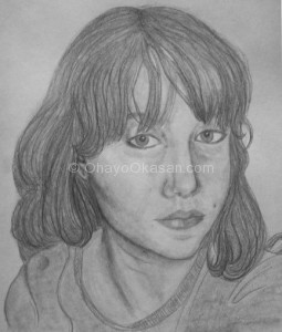This is a self portrait I did in a later class, in graphite thankfully! So I've gotten better at the self portrait thing. ;)
